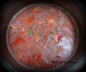 Boiling tomato juice, stock, chopped tomatoes together
